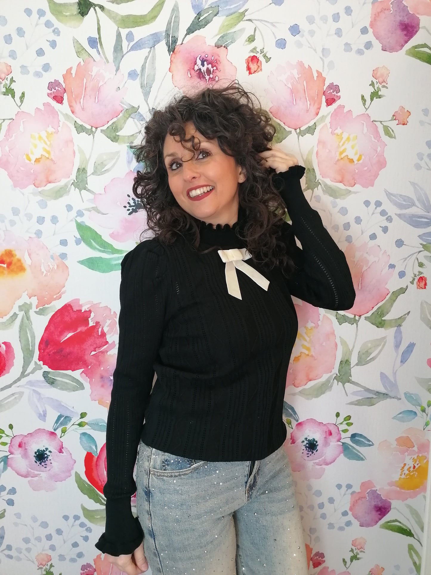 Maglia costine con fiocco
