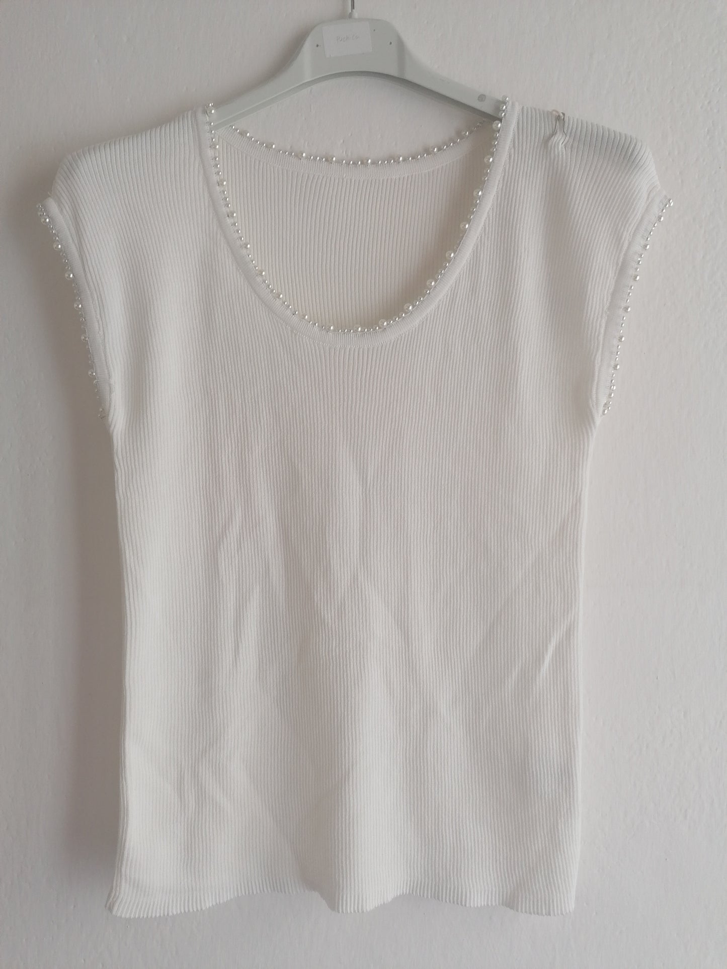 T-shirt riga di perline